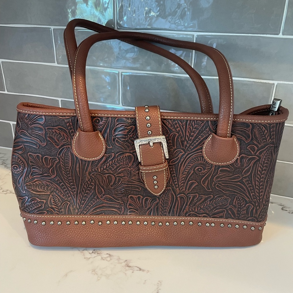 Trinity Ranch rich brown large handbag. Tooled pattern with studs.